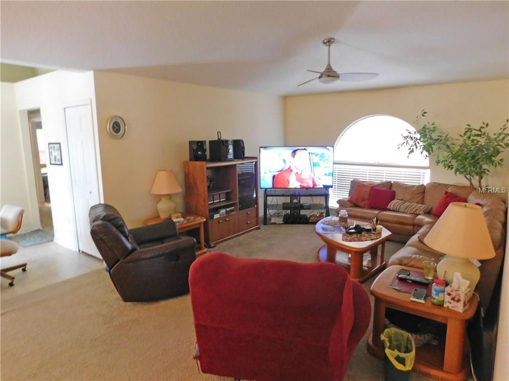 805 SUN RIDGE VILLAGE DRIVE, WINTER HAVEN, Florida 33880, 4 Bedrooms Bedrooms, 4 Rooms Rooms,2 BathroomsBathrooms,Residential,For sale,SUN RIDGE VILLAGE,O5561968