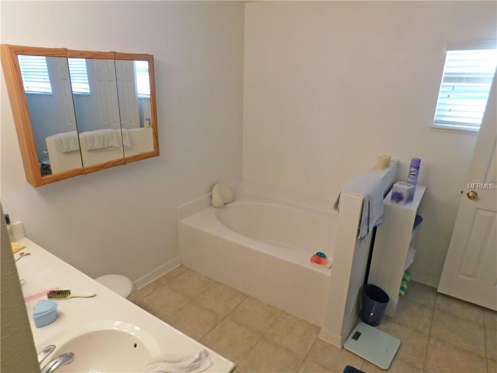 805 SUN RIDGE VILLAGE DRIVE, WINTER HAVEN, Florida 33880, 4 Bedrooms Bedrooms, 4 Rooms Rooms,2 BathroomsBathrooms,Residential,For sale,SUN RIDGE VILLAGE,O5561968