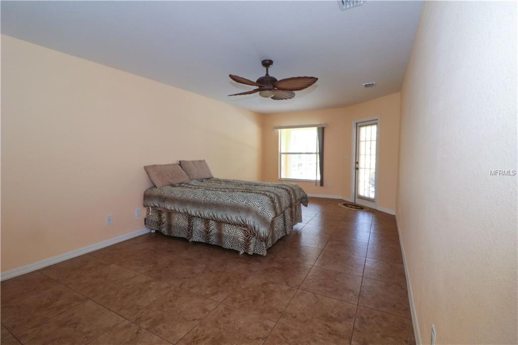 9433 GAZANIA DRIVE, PORT CHARLOTTE, Florida 33981, 5 Bedrooms Bedrooms, 9 Rooms Rooms,3 BathroomsBathrooms,Residential,For sale,GAZANIA,D5920346