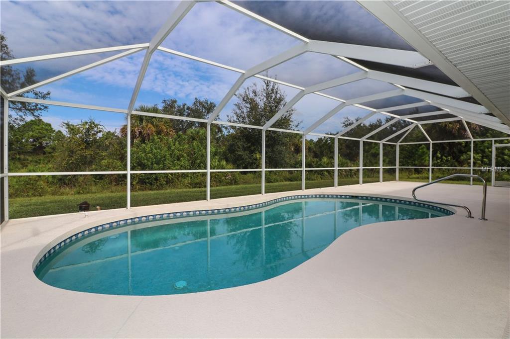 9433 GAZANIA DRIVE, PORT CHARLOTTE, Florida 33981, 5 Bedrooms Bedrooms, 9 Rooms Rooms,3 BathroomsBathrooms,Residential,For sale,GAZANIA,D5920346