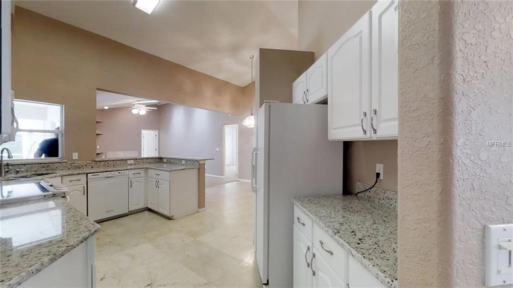 544 WILMINGTON CIRCLE, OVIEDO, Florida 32765, 5 Bedrooms Bedrooms, 9 Rooms Rooms,3 BathroomsBathrooms,Residential,For sale,WILMINGTON,O5555295