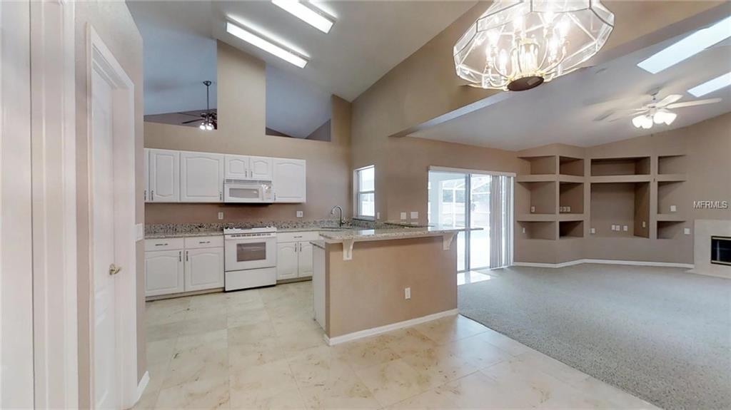 544 WILMINGTON CIRCLE, OVIEDO, Florida 32765, 5 Bedrooms Bedrooms, 9 Rooms Rooms,3 BathroomsBathrooms,Residential,For sale,WILMINGTON,O5555295