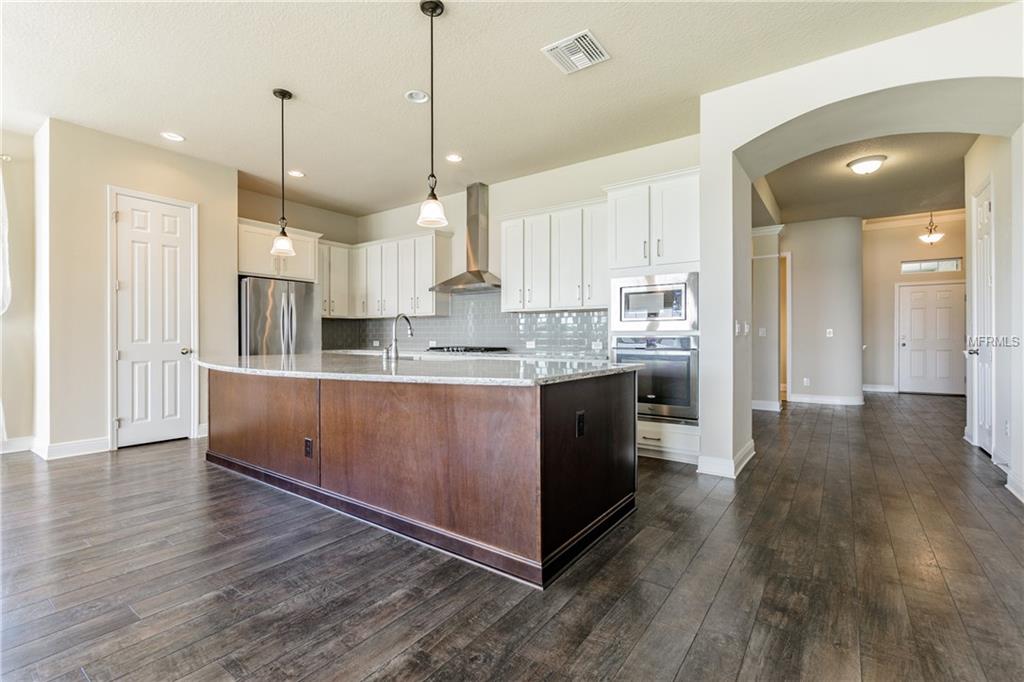 7221 HOURGLASS DRIVE, APOLLO BEACH, Florida 33572, 4 Bedrooms Bedrooms, 9 Rooms Rooms,3 BathroomsBathrooms,Residential,For sale,HOURGLASS,T2912784