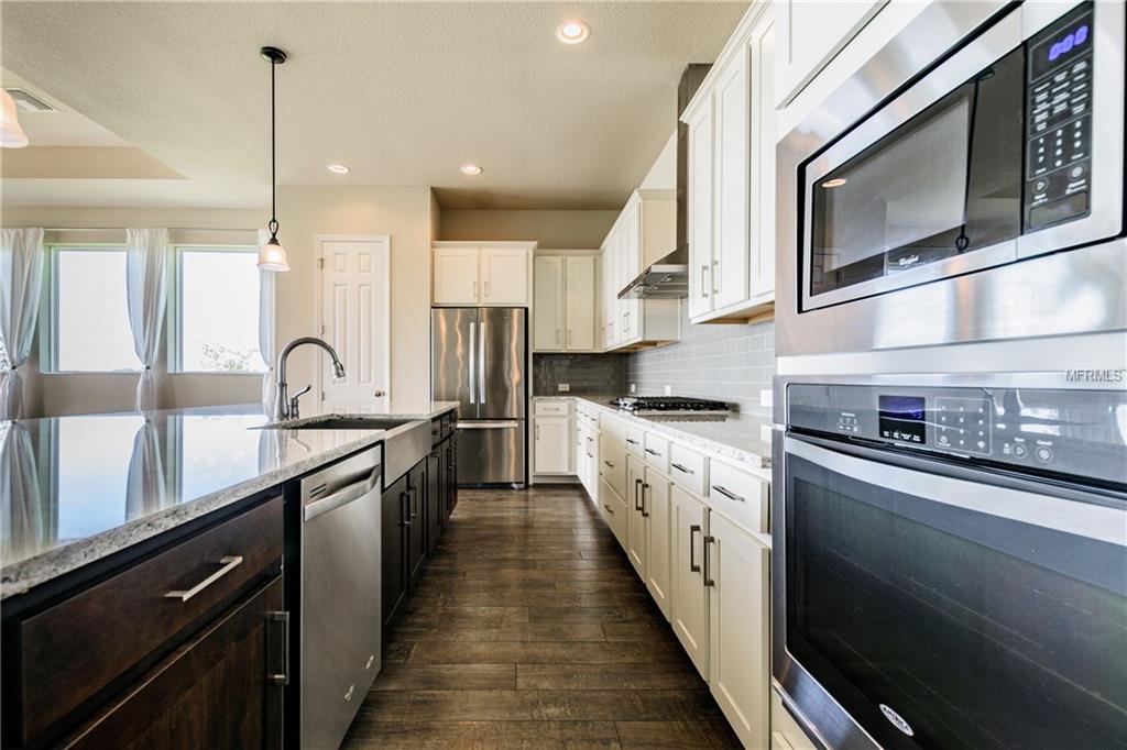 7221 HOURGLASS DRIVE, APOLLO BEACH, Florida 33572, 4 Bedrooms Bedrooms, 9 Rooms Rooms,3 BathroomsBathrooms,Residential,For sale,HOURGLASS,T2912784