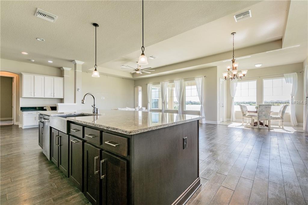 7221 HOURGLASS DRIVE, APOLLO BEACH, Florida 33572, 4 Bedrooms Bedrooms, 9 Rooms Rooms,3 BathroomsBathrooms,Residential,For sale,HOURGLASS,T2912784