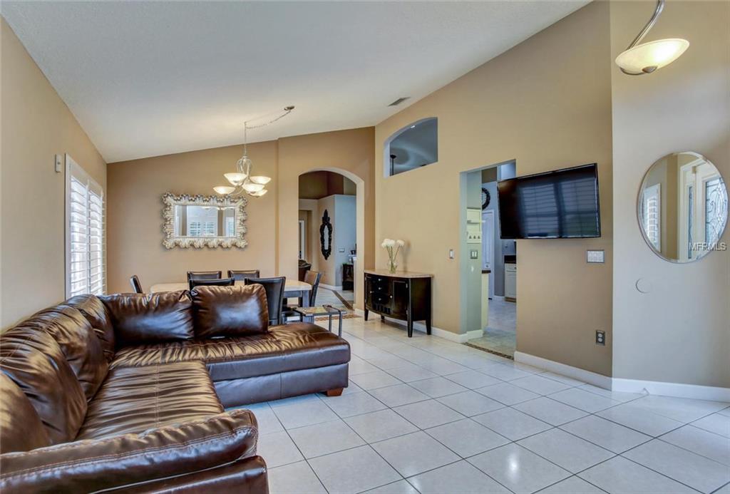 1240 BLUFFS CIRCLE, DUNEDIN, Florida 34698, 3 Bedrooms Bedrooms, 4 Rooms Rooms,2 BathroomsBathrooms,Residential,For sale,BLUFFS,U7847477