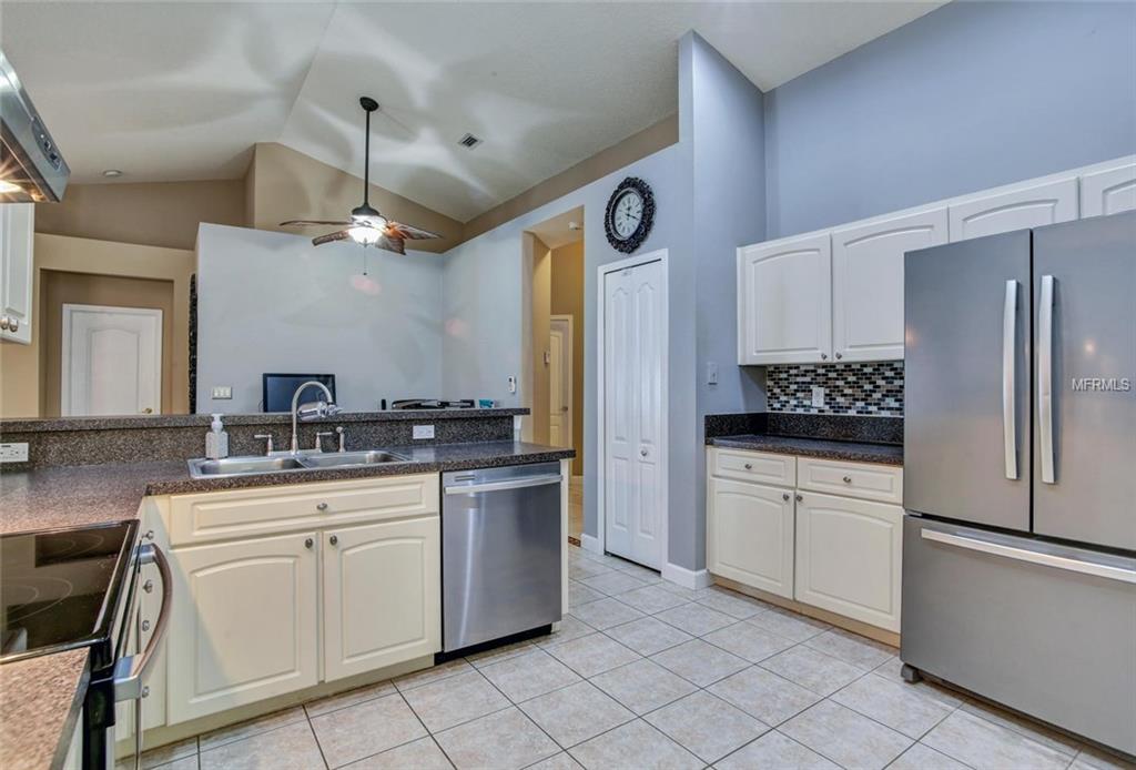 1240 BLUFFS CIRCLE, DUNEDIN, Florida 34698, 3 Bedrooms Bedrooms, 4 Rooms Rooms,2 BathroomsBathrooms,Residential,For sale,BLUFFS,U7847477