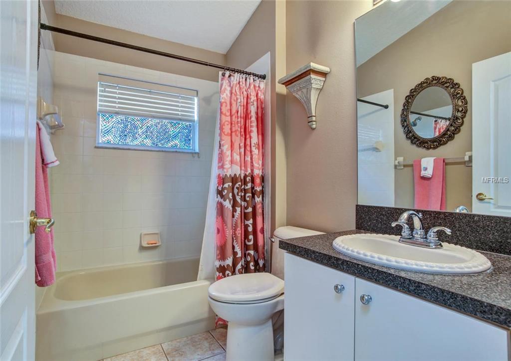 1240 BLUFFS CIRCLE, DUNEDIN, Florida 34698, 3 Bedrooms Bedrooms, 4 Rooms Rooms,2 BathroomsBathrooms,Residential,For sale,BLUFFS,U7847477