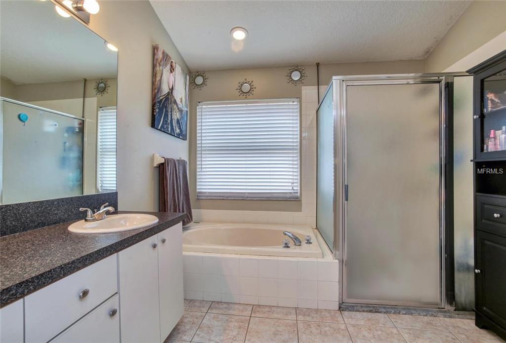 1240 BLUFFS CIRCLE, DUNEDIN, Florida 34698, 3 Bedrooms Bedrooms, 4 Rooms Rooms,2 BathroomsBathrooms,Residential,For sale,BLUFFS,U7847477