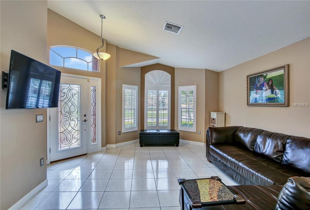 1240 BLUFFS CIRCLE, DUNEDIN, Florida 34698, 3 Bedrooms Bedrooms, 4 Rooms Rooms,2 BathroomsBathrooms,Residential,For sale,BLUFFS,U7847477