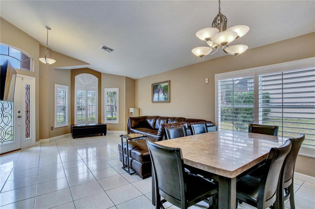 1240 BLUFFS CIRCLE, DUNEDIN, Florida 34698, 3 Bedrooms Bedrooms, 4 Rooms Rooms,2 BathroomsBathrooms,Residential,For sale,BLUFFS,U7847477