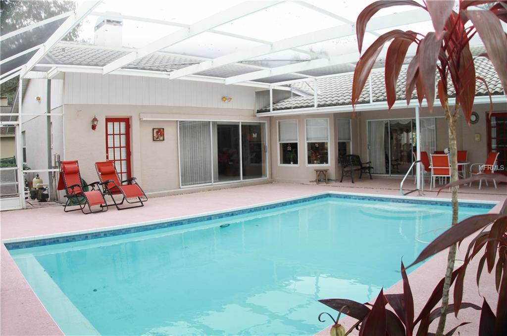 5497 OAKRIDGE DRIVE, PALM HARBOR, Florida 34685, 4 Bedrooms Bedrooms, 8 Rooms Rooms,3 BathroomsBathrooms,Residential,For sale,OAKRIDGE,U7840694