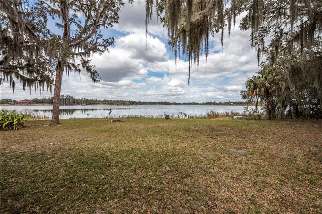 7613 FLAME FLOWER LANE, LAKE WALES, Florida 33898, 4 Bedrooms Bedrooms, 9 Rooms Rooms,3 BathroomsBathrooms,Residential,For sale,FLAME FLOWER,P4718889