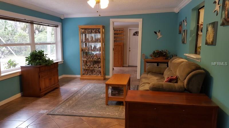 311 ELLINGTON STREET, PORT CHARLOTTE, Florida 33953, 3 Bedrooms Bedrooms, 8 Rooms Rooms,2 BathroomsBathrooms,Residential,For sale,ELLINGTON,W7637381