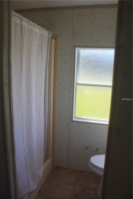 580 LAKESIDE BOULEVARD, KENANSVILLE, Florida 34739, 2 Bedrooms Bedrooms, 6 Rooms Rooms,2 BathroomsBathrooms,Residential,For sale,LAKESIDE,S4848109