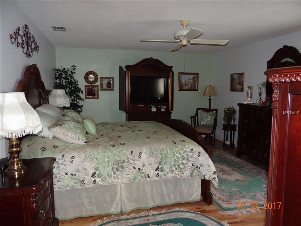 34333 WHISPERING OAKS BOULEVARD, DADE CITY, Florida 33523, 3 Bedrooms Bedrooms, 6 Rooms Rooms,2 BathroomsBathrooms,Residential,For sale,WHISPERING OAKS,A4209494