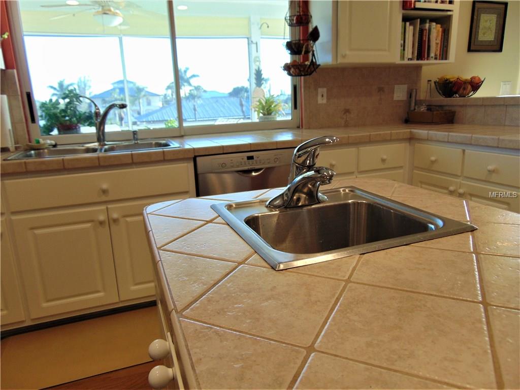 24337 TREASURE ISLAND BOULEVARD, PUNTA GORDA, Florida 33955, 3 Bedrooms Bedrooms, 6 Rooms Rooms,2 BathroomsBathrooms,Residential,For sale,TREASURE ISLAND,C7246474