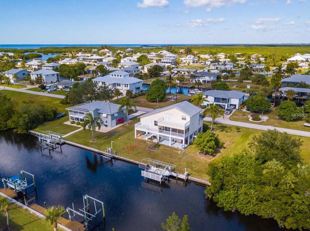 24337 TREASURE ISLAND BOULEVARD, PUNTA GORDA, Florida 33955, 3 Bedrooms Bedrooms, 6 Rooms Rooms,2 BathroomsBathrooms,Residential,For sale,TREASURE ISLAND,C7246474