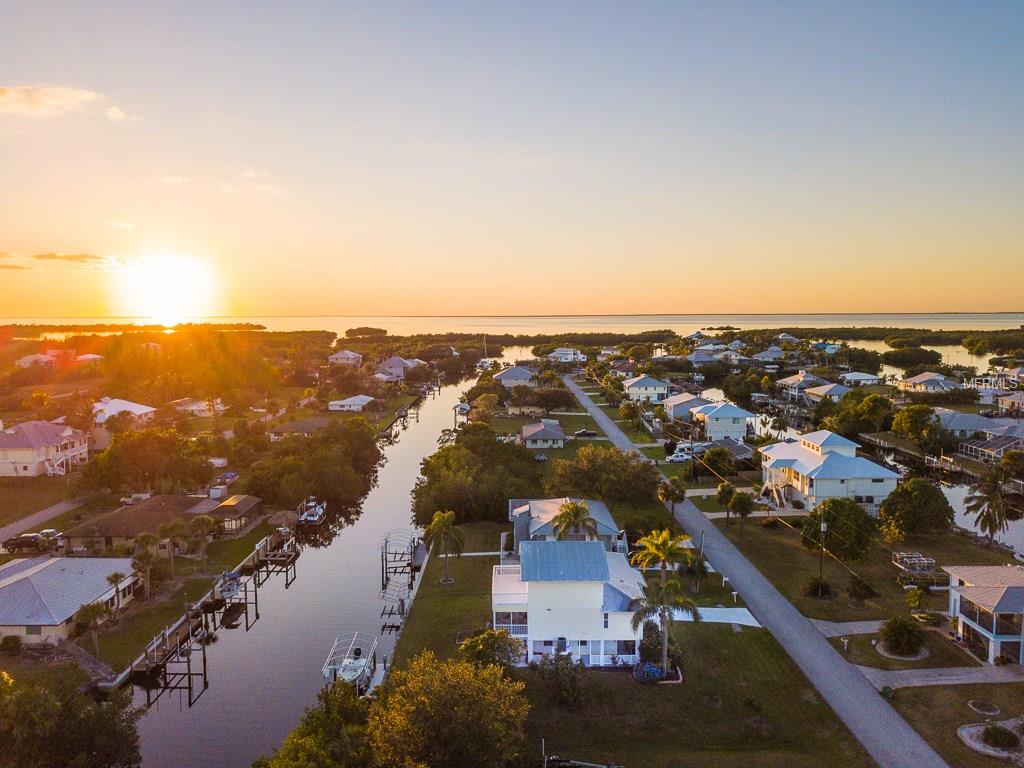 24337 TREASURE ISLAND BOULEVARD, PUNTA GORDA, Florida 33955, 3 Bedrooms Bedrooms, 6 Rooms Rooms,2 BathroomsBathrooms,Residential,For sale,TREASURE ISLAND,C7246474