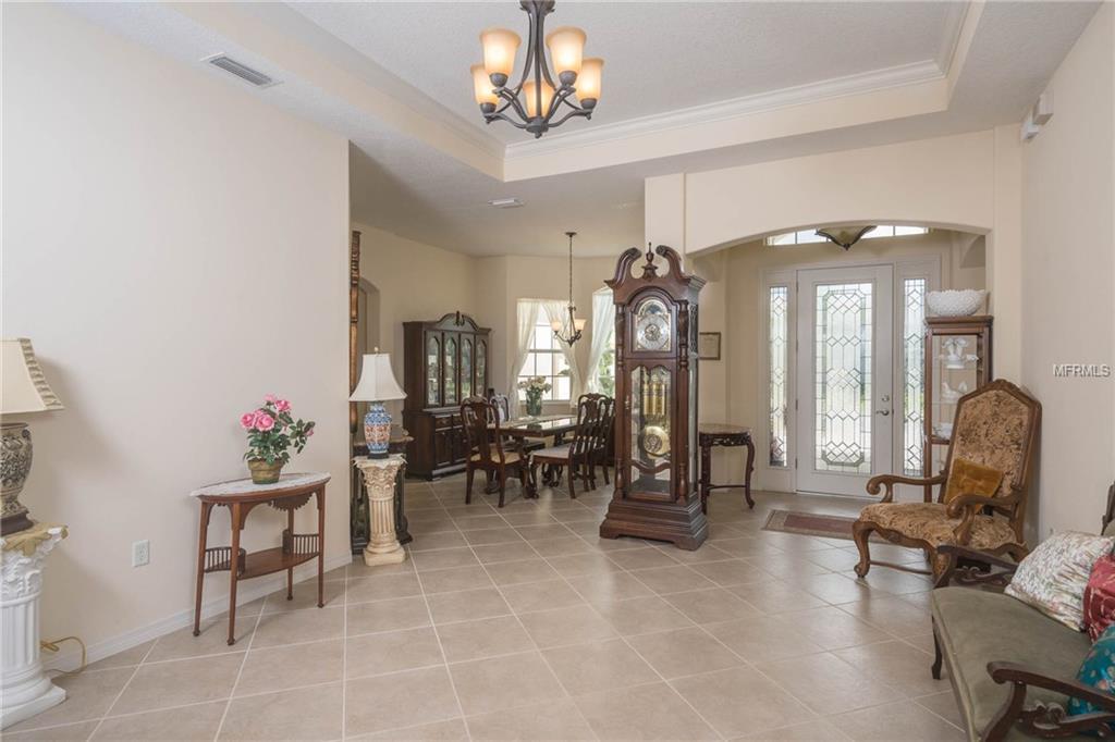 8757 BRIDGEPORT BAY CIRCLE, MOUNT DORA, Florida 32757, 4 Bedrooms Bedrooms, 10 Rooms Rooms,3 BathroomsBathrooms,Residential,For sale,BRIDGEPORT BAY,G4847672