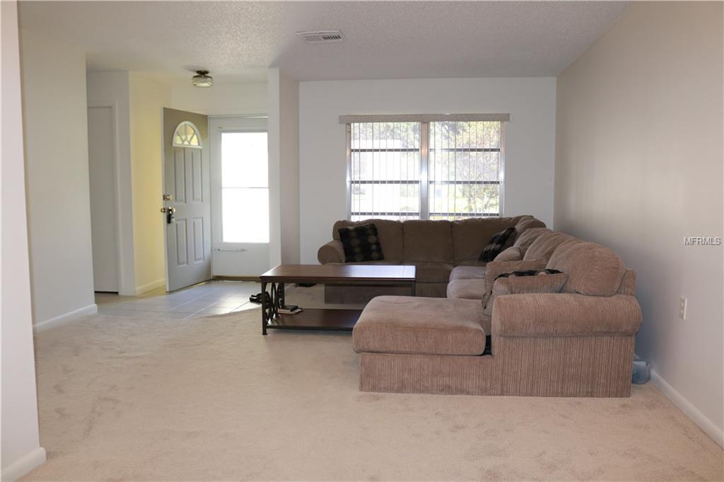 10525 MEADOW HILL DRIVE, PORT RICHEY, Florida 34668, 3 Bedrooms Bedrooms, 8 Rooms Rooms,2 BathroomsBathrooms,Residential,For sale,MEADOW HILL,W7636211