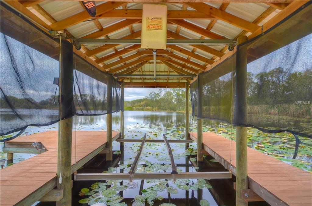 2252 CAMP INDIANHEAD ROAD, LAND O LAKES, Florida 34639, 5 Bedrooms Bedrooms, 7 Rooms Rooms,4 BathroomsBathrooms,Residential,For sale,CAMP INDIANHEAD,T2920968