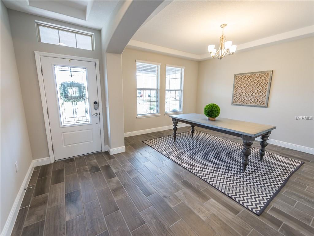 16221 ROCK COAST DRIVE, WINTER GARDEN, Florida 34787, 5 Bedrooms Bedrooms, 10 Rooms Rooms,3 BathroomsBathrooms,Residential,For sale,ROCK COAST,O5559693