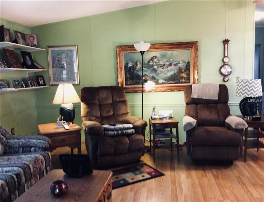 1715 PEBBLE BEACH LANE, LADY LAKE, Florida 32159, 2 Bedrooms Bedrooms, 5 Rooms Rooms,2 BathroomsBathrooms,Residential,For sale,PEBBLE BEACH,G4852598