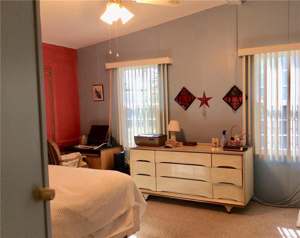 1715 PEBBLE BEACH LANE, LADY LAKE, Florida 32159, 2 Bedrooms Bedrooms, 5 Rooms Rooms,2 BathroomsBathrooms,Residential,For sale,PEBBLE BEACH,G4852598