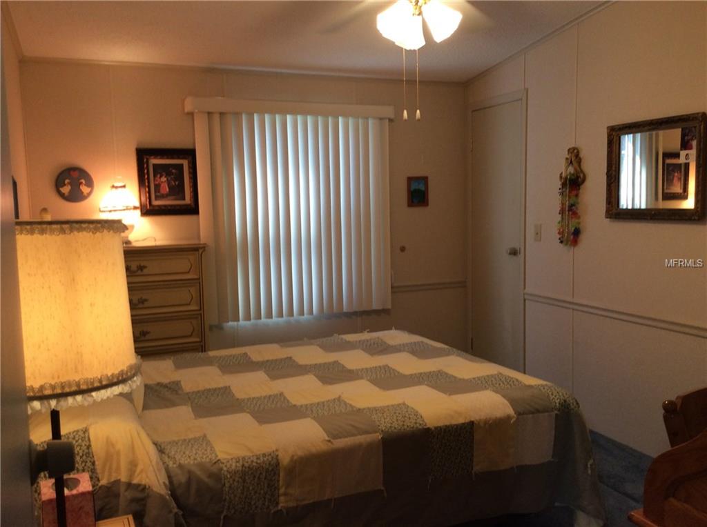 1715 PEBBLE BEACH LANE, LADY LAKE, Florida 32159, 2 Bedrooms Bedrooms, 5 Rooms Rooms,2 BathroomsBathrooms,Residential,For sale,PEBBLE BEACH,G4852598