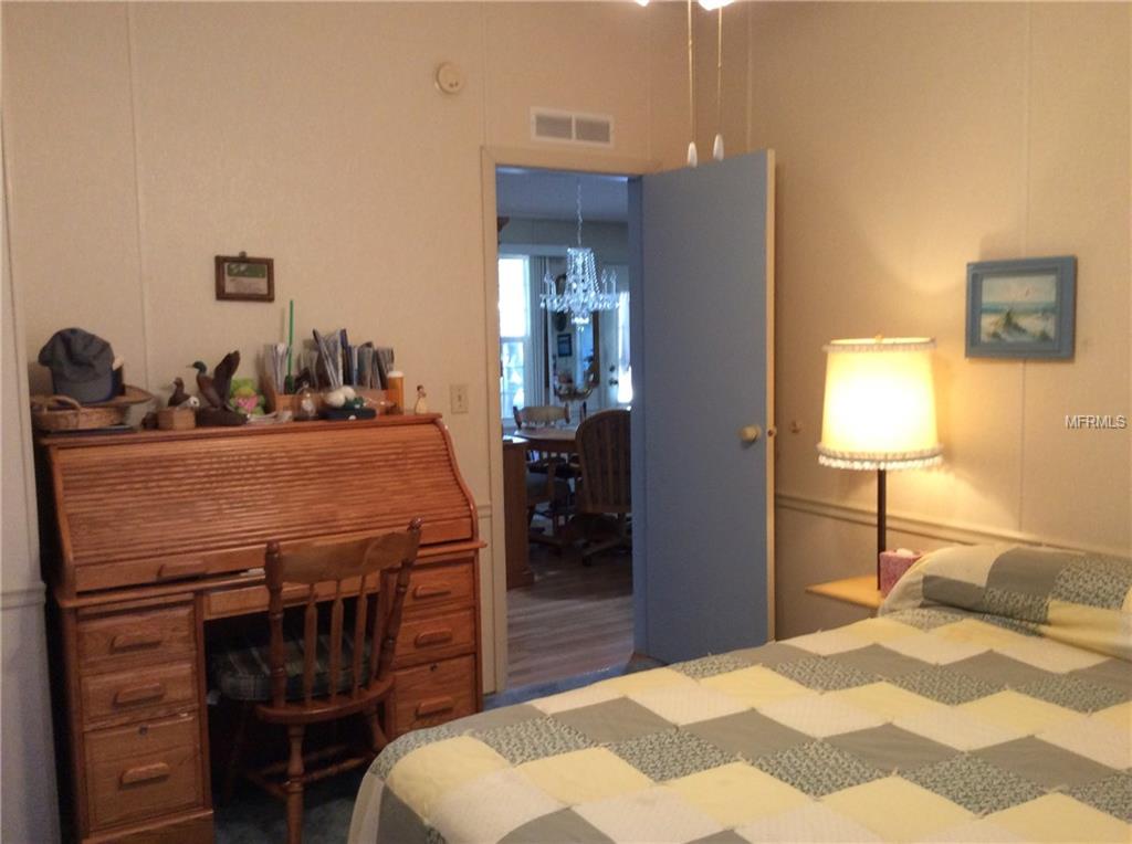 1715 PEBBLE BEACH LANE, LADY LAKE, Florida 32159, 2 Bedrooms Bedrooms, 5 Rooms Rooms,2 BathroomsBathrooms,Residential,For sale,PEBBLE BEACH,G4852598