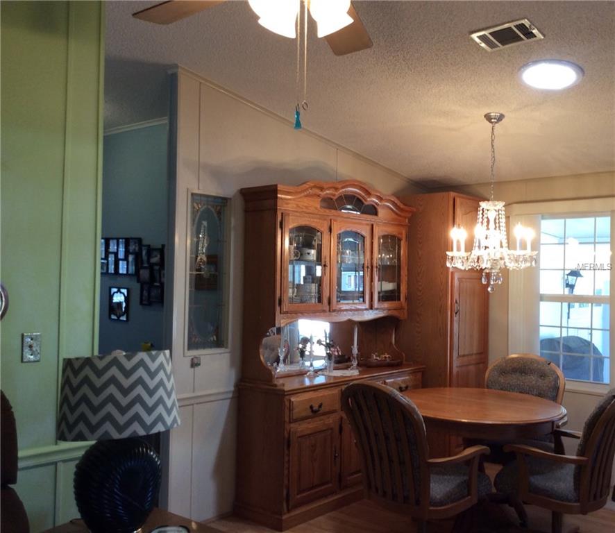 1715 PEBBLE BEACH LANE, LADY LAKE, Florida 32159, 2 Bedrooms Bedrooms, 5 Rooms Rooms,2 BathroomsBathrooms,Residential,For sale,PEBBLE BEACH,G4852598