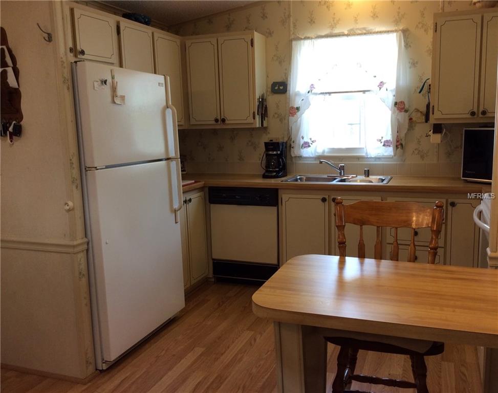 1715 PEBBLE BEACH LANE, LADY LAKE, Florida 32159, 2 Bedrooms Bedrooms, 5 Rooms Rooms,2 BathroomsBathrooms,Residential,For sale,PEBBLE BEACH,G4852598