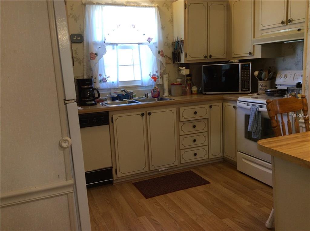 1715 PEBBLE BEACH LANE, LADY LAKE, Florida 32159, 2 Bedrooms Bedrooms, 5 Rooms Rooms,2 BathroomsBathrooms,Residential,For sale,PEBBLE BEACH,G4852598