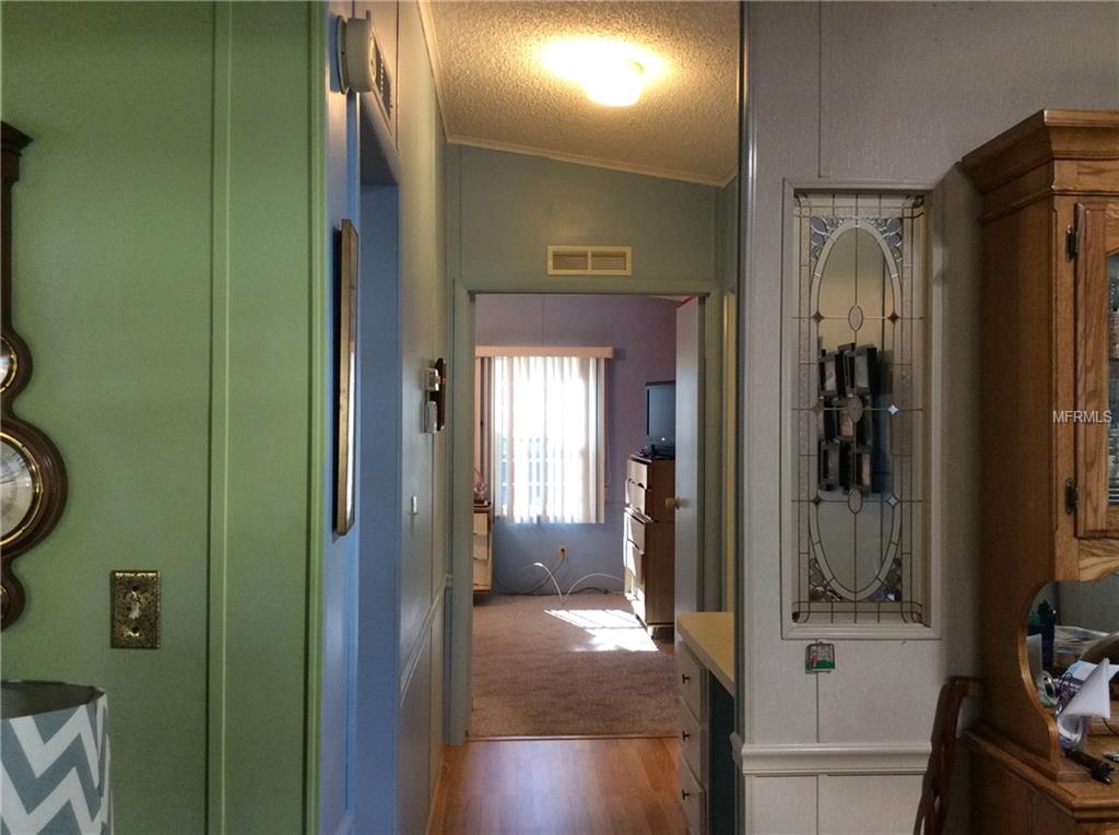 1715 PEBBLE BEACH LANE, LADY LAKE, Florida 32159, 2 Bedrooms Bedrooms, 5 Rooms Rooms,2 BathroomsBathrooms,Residential,For sale,PEBBLE BEACH,G4852598