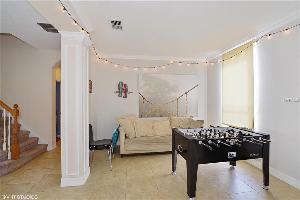 7631 KINGS PASSAGE AVENUE, ORLANDO, Florida 32835, 5 Bedrooms Bedrooms, 11 Rooms Rooms,3 BathroomsBathrooms,Residential,For sale,KINGS PASSAGE,O5560962