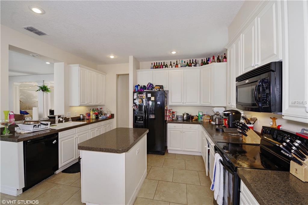 7631 KINGS PASSAGE AVENUE, ORLANDO, Florida 32835, 5 Bedrooms Bedrooms, 11 Rooms Rooms,3 BathroomsBathrooms,Residential,For sale,KINGS PASSAGE,O5560962