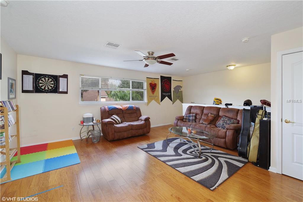 7631 KINGS PASSAGE AVENUE, ORLANDO, Florida 32835, 5 Bedrooms Bedrooms, 11 Rooms Rooms,3 BathroomsBathrooms,Residential,For sale,KINGS PASSAGE,O5560962