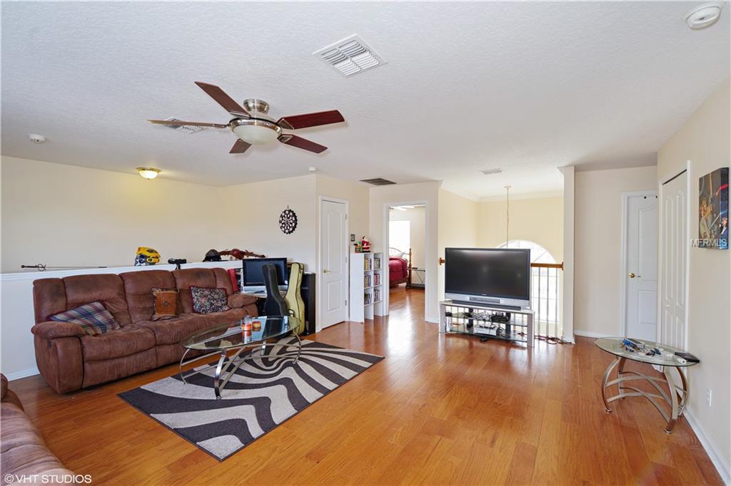 7631 KINGS PASSAGE AVENUE, ORLANDO, Florida 32835, 5 Bedrooms Bedrooms, 11 Rooms Rooms,3 BathroomsBathrooms,Residential,For sale,KINGS PASSAGE,O5560962