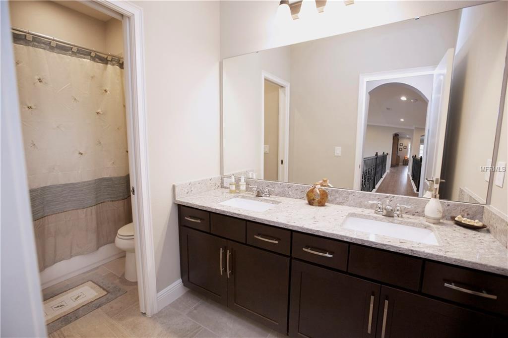 8233 CANETTI STREET, ORLANDO, Florida 32827, 4 Bedrooms Bedrooms, 10 Rooms Rooms,3 BathroomsBathrooms,Residential,For sale,CANETTI,O5561468