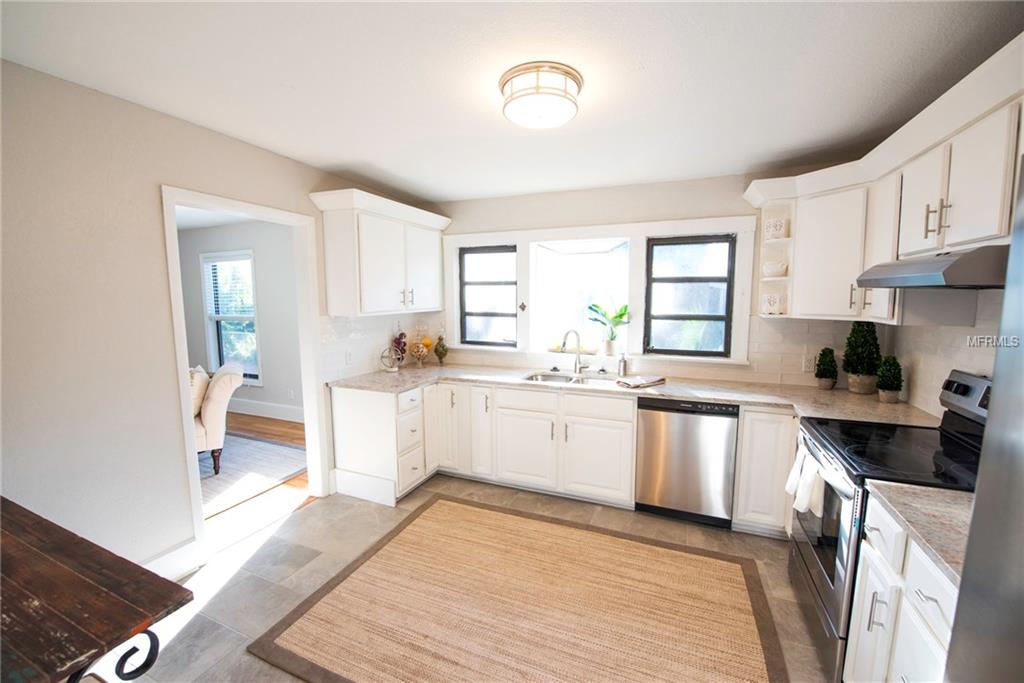 1006 E POWHATAN AVENUE, TAMPA, Florida 33604, 2 Bedrooms Bedrooms, 4 Rooms Rooms,2 BathroomsBathrooms,Residential,For sale,POWHATAN,T2909941