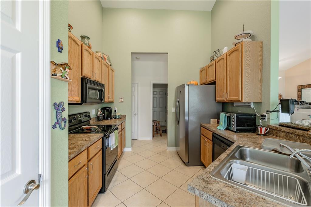 5373 OXFORD MANOR CIRCLE, LAKELAND, Florida 33810, 4 Bedrooms Bedrooms, 7 Rooms Rooms,2 BathroomsBathrooms,Residential,For sale,OXFORD MANOR,T2928597