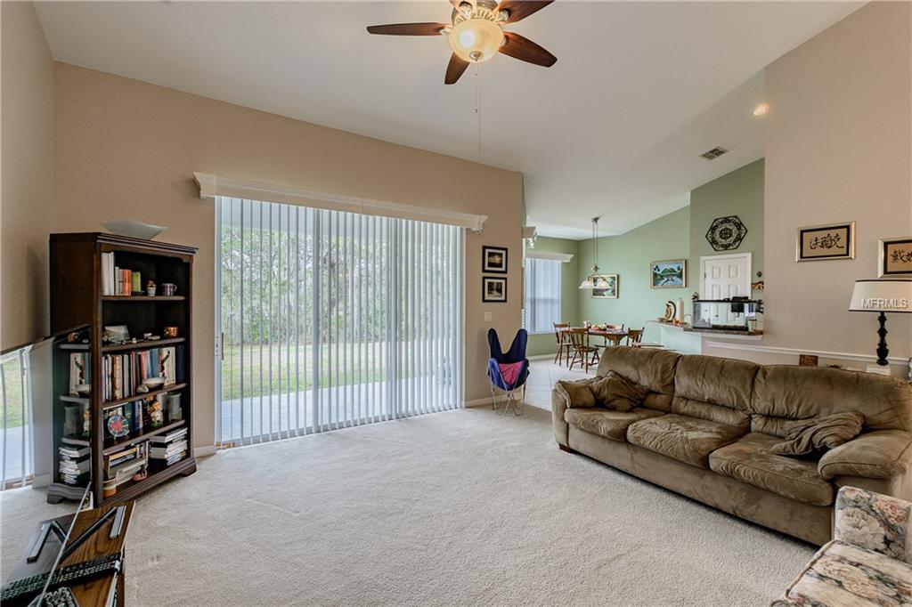 5373 OXFORD MANOR CIRCLE, LAKELAND, Florida 33810, 4 Bedrooms Bedrooms, 7 Rooms Rooms,2 BathroomsBathrooms,Residential,For sale,OXFORD MANOR,T2928597