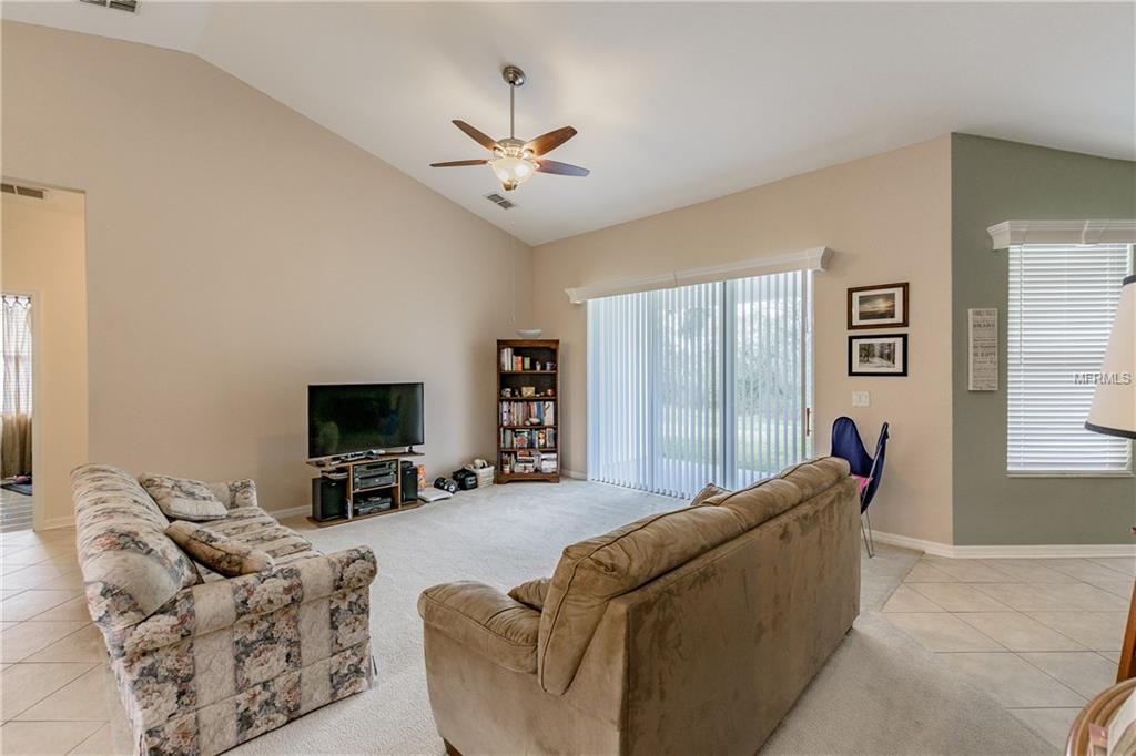 5373 OXFORD MANOR CIRCLE, LAKELAND, Florida 33810, 4 Bedrooms Bedrooms, 7 Rooms Rooms,2 BathroomsBathrooms,Residential,For sale,OXFORD MANOR,T2928597