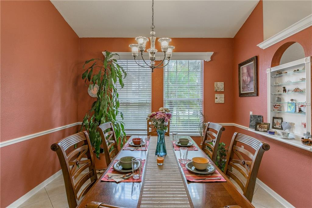 5373 OXFORD MANOR CIRCLE, LAKELAND, Florida 33810, 4 Bedrooms Bedrooms, 7 Rooms Rooms,2 BathroomsBathrooms,Residential,For sale,OXFORD MANOR,T2928597