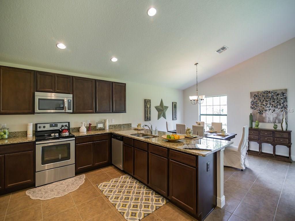 1021 COATBRIDGE DRIVE, KISSIMMEE, Florida 34758, 4 Bedrooms Bedrooms, 8 Rooms Rooms,2 BathroomsBathrooms,Residential,For sale,COATBRIDGE,O5550603