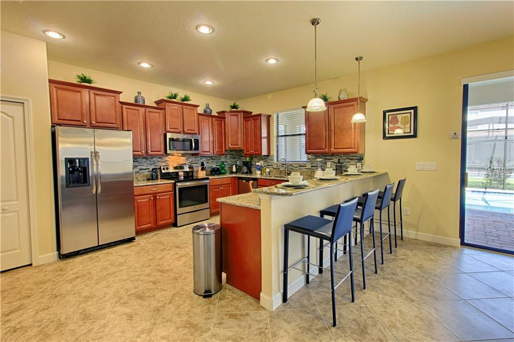 9109 EL CARO LANE, DAVENPORT, Florida 33896, 6 Bedrooms Bedrooms, 11 Rooms Rooms,6 BathroomsBathrooms,Residential,For sale,EL CARO,O5561475