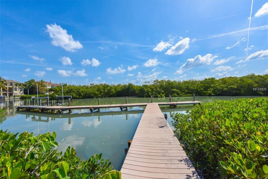 1232 OYSTER COVE DRIVE, SARASOTA, Florida 34242, 4 Bedrooms Bedrooms, 10 Rooms Rooms,4 BathroomsBathrooms,Residential,For sale,OYSTER COVE,A4190489