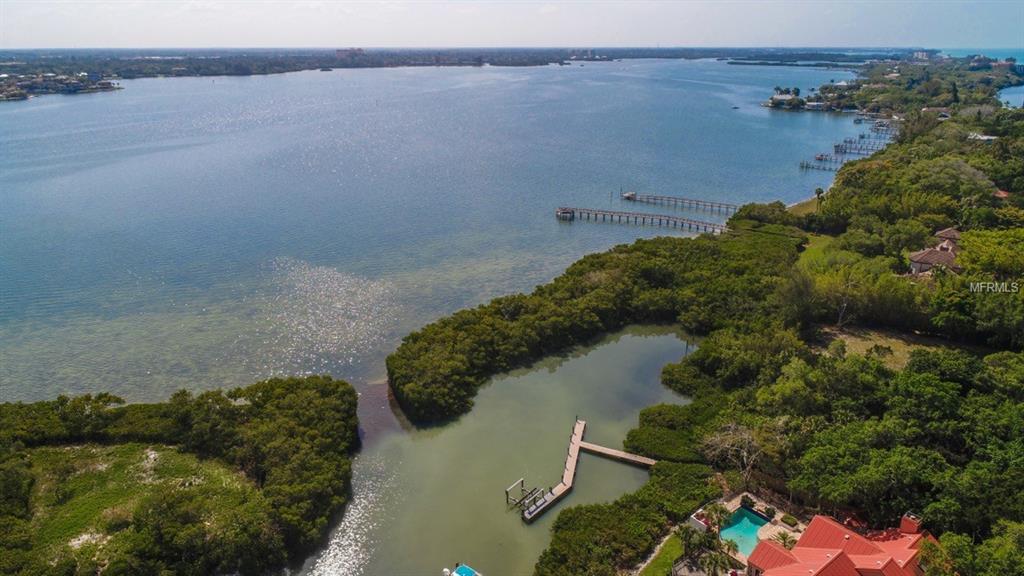 1232 OYSTER COVE DRIVE, SARASOTA, Florida 34242, 4 Bedrooms Bedrooms, 10 Rooms Rooms,4 BathroomsBathrooms,Residential,For sale,OYSTER COVE,A4190489