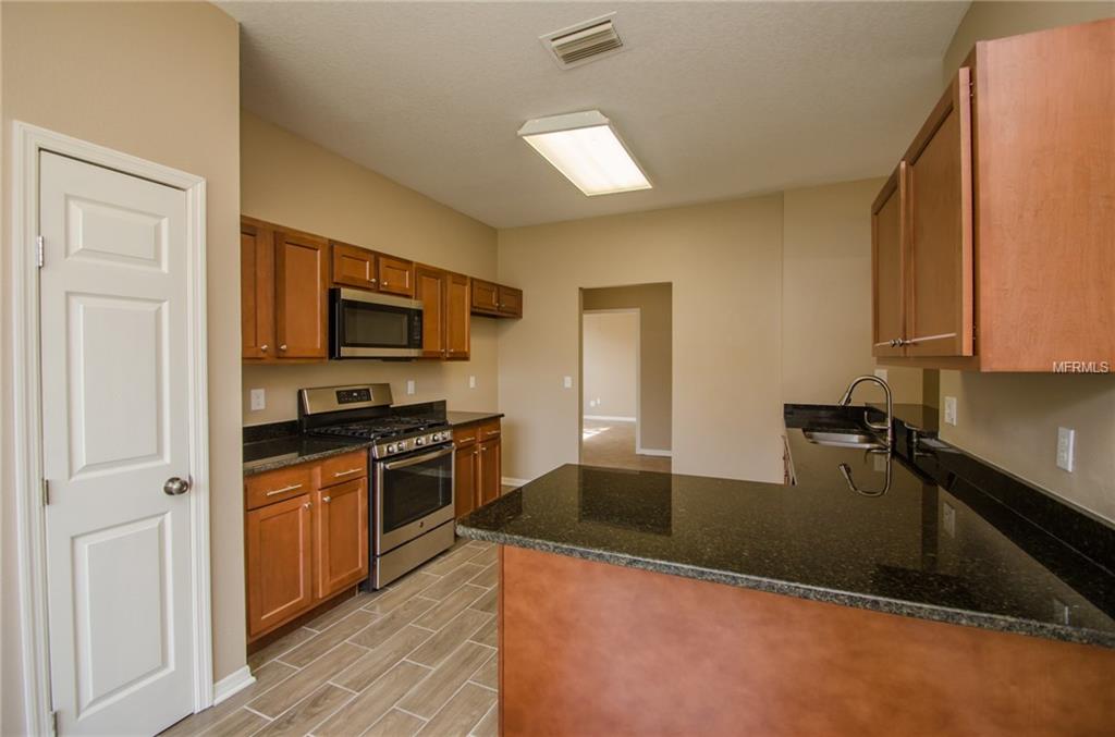 1936 GRENVILLE COURT, WESLEY CHAPEL, Florida 33543, 4 Bedrooms Bedrooms, 3 Rooms Rooms,2 BathroomsBathrooms,Residential,For sale,GRENVILLE,T2928240